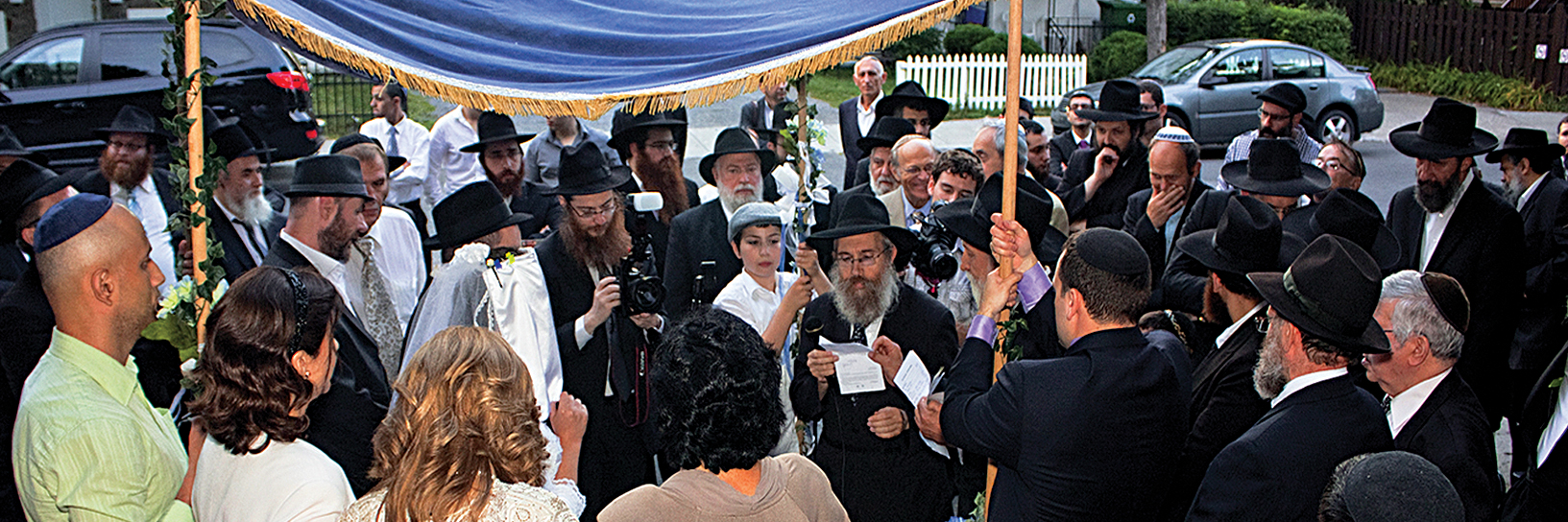 Traditional outdoor Jewish wedding Chuppah ceremony